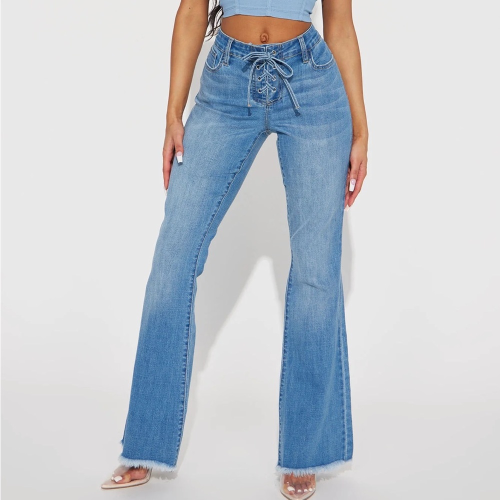 Medium wash lace up flare jeans